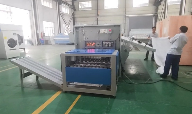 航星洗滌機械廠家調(diào)試-折疊機堆碼機工作